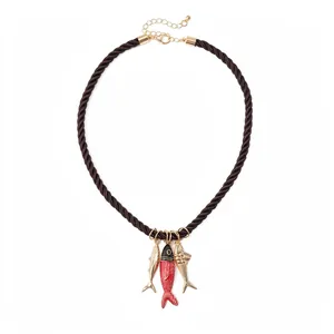 Handmade brown rope necklace with three fish pendants for summer beach vacation style