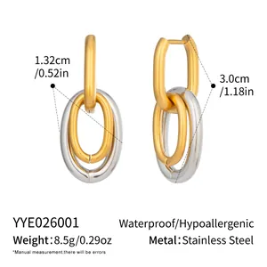 Detailed size chart and material specs for two-tone U-shaped stainless steel earrings.
