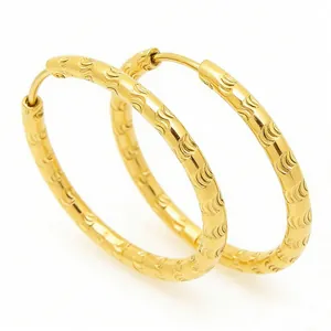 Elegant large 18K gold plated stainless steel hoop earrings featuring an embossed wave texture.