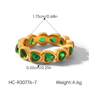 Detailed view of a gold heart-shaped green zircon ring with size and weight info.