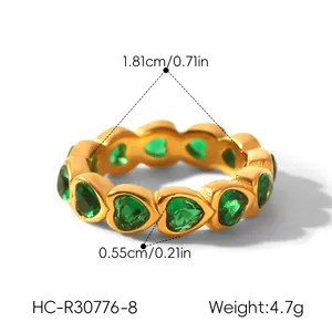 Detail showing measurements of gold-plated stainless steel ring with green heart zircons