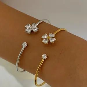 Bracelet jonc ouvert élégant en acier inoxydable avec incrustation de trèfle en cristal