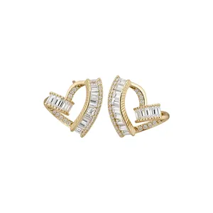 Elegant heart-shaped stud earrings in gold with baguette and round cubic zirconia