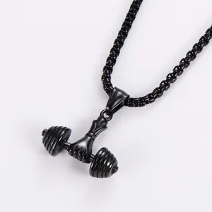 Close-up of black stainless steel dumbbell pendant with hand-holding design on box chain