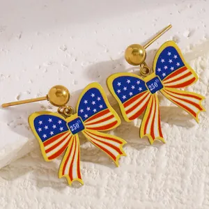 Close-up of 250th anniversary USA Independence Day bow earrings with flag pattern