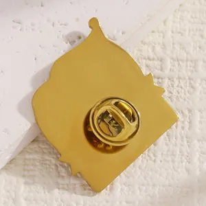 Detailed back view of a gold-plated commemorative pin with a secure butterfly clutch.