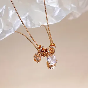 Close-up of square zircon pendant on 18k rose gold plated necklace chain