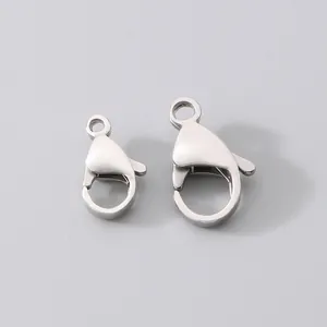 Macro view of two 304 stainless steel lobster clasps for DIY jewelry making.