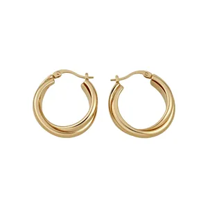 Minimalist polished gold twisted double hoop earrings for a stylish look.