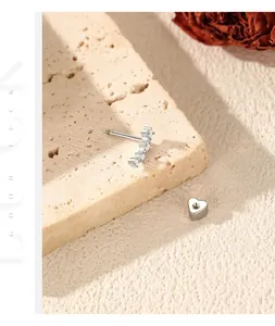 Close-up of S925 sterling silver moissanite earring with heart-shaped threaded back