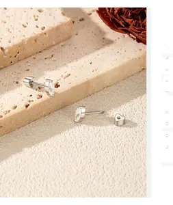Close-up detail of marquise moissanite S925 silver screw-back stud earrings
