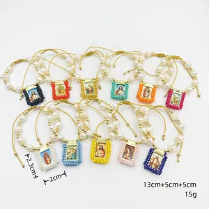 Handmade religious pearl bracelets with colorful woven frames and various icon pendants