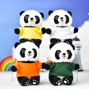 A detailed close-up of four adorable panda plush dolls wearing colorful tiny t-shirts.