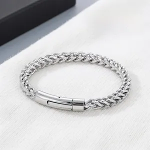 Close-up of vintage stainless steel keel chain bracelet showing smooth wheat pattern