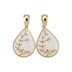 Elegant teardrop earrings with white enamel and golden floral patterns in Chinese style.