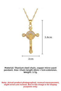 Detailed view of golden cross pendant with micro-set zircons and 3.8cm height