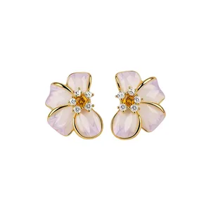 Exquisite purple enamel flower stud earrings with sparkling zircon centers in gold finish