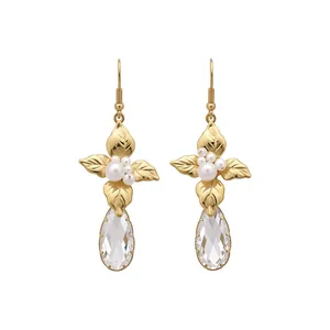 Elegant gold leaf and pearl drop earrings with a faceted clear teardrop crystal pendant