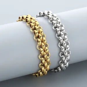 Detailed view of triple-row woven stainless steel bracelets in gold and silver tones