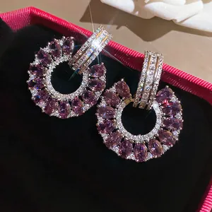 Elegante paarse kristallen bloem hanger oorbellen met zilveren steker