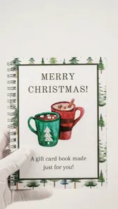 Weihnachtsgeschenk-Kartenheft mit weißem Cover und fröhlichen Tannenbaum-Illustrationen