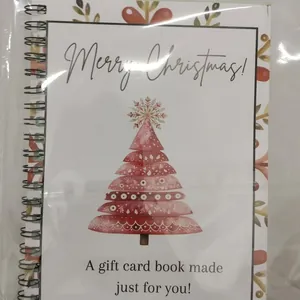 Christmas spiral notebook with red layered tree design in transparent gift packaging