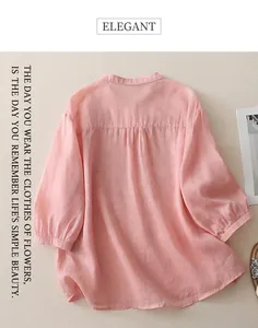 Detailed back view of pink cotton linen blouse showing refined pleated texture and soft fabric