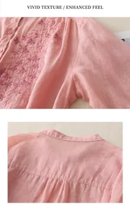 Close-up of pink linen shirt with intricate floral embroidery and stand collar