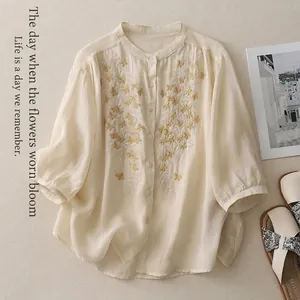 Ethnic style cotton linen shirt with floral embroidery and button-up front in beige