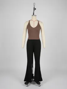 Detail of coffee brown ribbed V-neck knit vest and high waist slim flared pants set