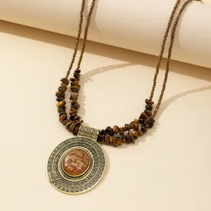 Vintage bronze necklace with round tiger eye stone pendant and beaded double strand chain