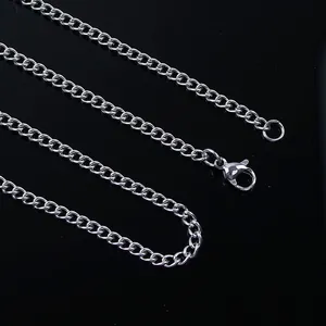 Polished stainless steel curb chain necklace with a secure lobster clasp on black background