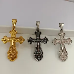 Ensemble de pendentifs croix orthodoxe en or, argent et noir avec détails en relief