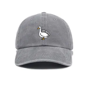 Close-up of silly goose embroidery on washed dark grey vintage cotton baseball cap