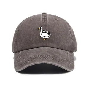 Close-up of Silly Goose embroidery on charcoal washed cotton vintage baseball cap