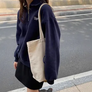 Navy blue half-zip polo sweatshirt with letter embroidery for a casual street style