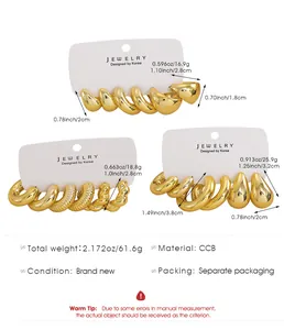 Detailed view of chunky gold CCB C-shape earring set with size and weight specs