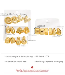 Close-up of gold CCB earring set showing heart, spiral and teardrop geometric designs
