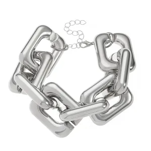 Detail of silver thick rectangle link bracelet with lobster clasp and mirror finish