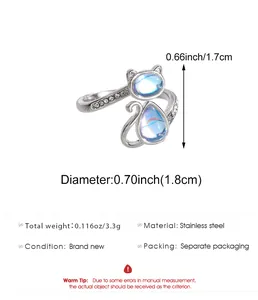 Detailed view of silver cat paw ring with cubic zirconia and size specifications