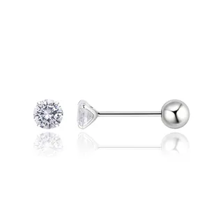 Macro detail of S925 sterling silver screw back stud earrings with four-prong zircon