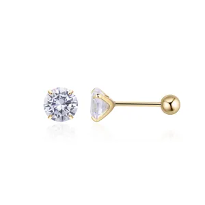 Detailed macro of gold S925 sterling silver screw back stud earrings with round cubic zirconia
