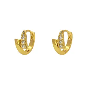 Orecchini a cerchio vintage in oro francese con struttura incrociata e quattro zirconi