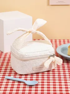 Sweet white lace floral cosmetic bag with bow handle on red checkered cloth