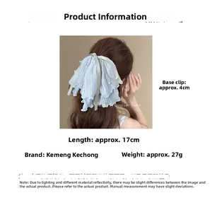 Detail of light blue mesh bow hair clip with pearls and 4cm metal shark clip fastener