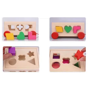 Wooden shape sorter bus toy with colorful blocks and pull-along rope for toddlers