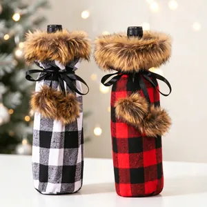 Classic red and black plaid Christmas wine bottle covers with faux fur collars and bows