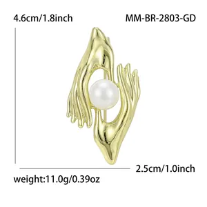 Detailed view of the golden pearl hand brooch showing dimensions and 11g weight.
