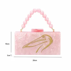 Pink marble acrylic clutch bag with bird engraving and beaded handle showing dimensions
