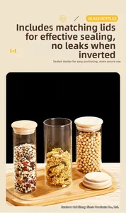 Detail of airtight glass storage jars with bamboo lids for kitchen grains and dried herbs